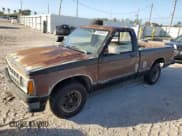 ✅ 1991 Chevrolet S-10 • VIN: 1GCCS14R2M8277598 • Лот: 79305564. Опубликован ранее на Copart с пробегом 196 340 миль. Бесплатный доступ к архиву аукционных продаж из США и подробный отчёт об истории автомобиля на DreamBid. Изображение 1.