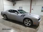 ✅ 2013 Dodge Challenger R/T • VIN: 2C3CDYBT2DH653569 • Lot: 62762874. Wystawiony na Copart z przebiegiem 161 726 mil. Bezpłatny archiwum sprzedaży aukcyjnych z USA i szczegółowy raport historii pojazdu na DreamBid. Zdjęcie 4.