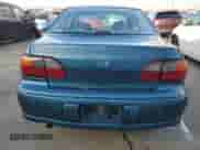 2003 Chevrolet Malibu z VIN 1G1ND52JX3M685885, wystawiony jako Copart lot #86604084 z przebiegiem 136 007 mil mil oraz Szkoda całkowita • Salvage title. Historia ofert i sprzedaży dostępna na DreamBid. Obrazek 6.