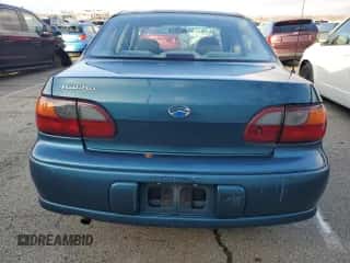 2003 Chevrolet Malibu z VIN 1G1ND52JX3M685885, wystawiony jako Copart lot #86604084 z przebiegiem 136 007 mil mil oraz Szkoda całkowita • Salvage title. Historia ofert i sprzedaży dostępna na DreamBid. Obrazek 6.