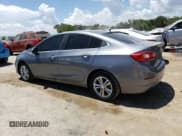 ✅ 2018 Chevrolet Cruze LT • VIN: 1G1BE5SM1J7241431 • Lot: 63491543. Listed on Copart with 64,775 mi. Free auction sales archive from the USA and detailed vehicle history report at DreamBid. Image 2.