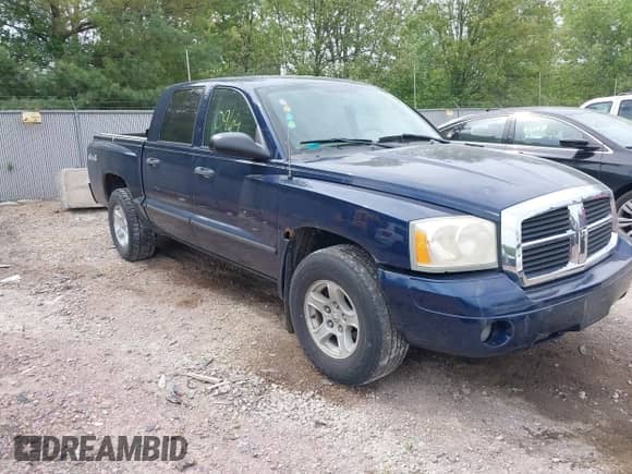 2006 Dodge Dakota SLT z VIN 1D7HW48J66S514184, wystawiony jako IAAI lot #42270964 z przebiegiem 105 857 mil mil oraz . Historia ofert i sprzedaży dostępna na DreamBid. Obrazek 1.
