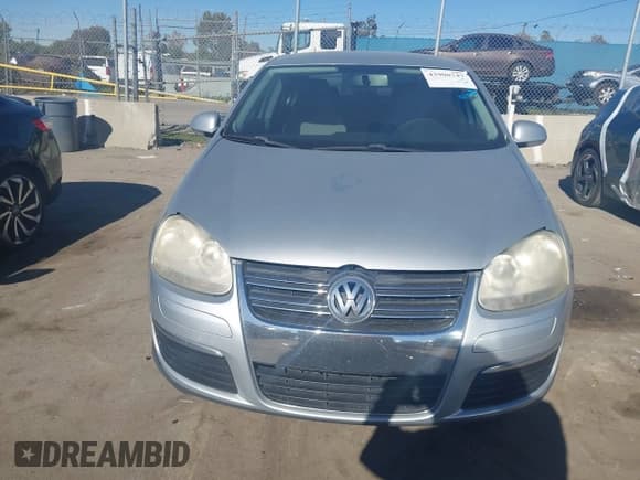 ✅ 2009 Volkswagen Jetta S • VIN: 3VWJZ71K99M087021 • Lot: 43900747. Listed on IAAI with 182,001 mi. Free auction sales archive from the USA and detailed vehicle history report at DreamBid. Image 6.