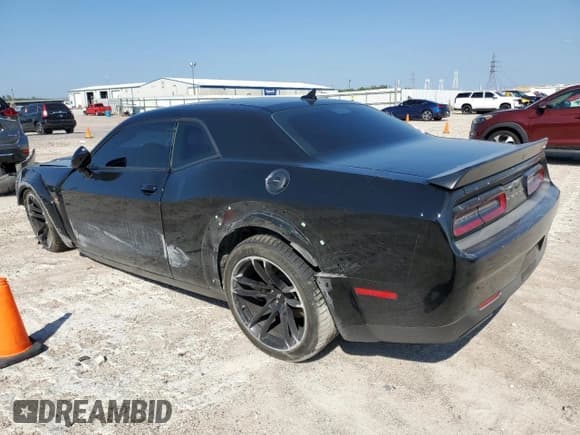 ✅ 2021 Dodge Challenger R/T Scat Pack • VIN: 2C3CDZFJ4MH603058 • Lot: 68479183. Listed on Copart with 27,619 mi. Free auction sales archive from the USA and detailed vehicle history report at DreamBid. Image 2.