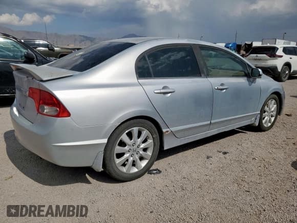 ✅ 2010 Honda Civic DX-VP • VIN: 2HGFA1E33AH521440 • Lot: 64039905. Listed on Copart with 141,690 mi. Free auction sales archive from the USA and detailed vehicle history report at DreamBid. Image 3.