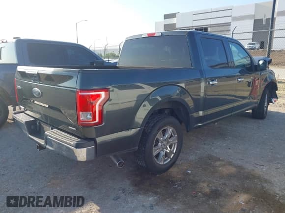 ✅ 2015 Ford F-150 XLT • VIN: 1FTEW1C85FKE72834 • Lot: 43000119. Listed on IAAI with 151,541 mi. Free auction sales archive from the USA and detailed vehicle history report at DreamBid. Image 4.