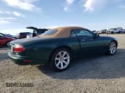 ✅ 2003 Jaguar XK • VIN: SAJDA42C232A31860 • Lot: 88586705. Wystawiony na Copart z przebiegiem 148 846 mil. Bezpłatny archiwum sprzedaży aukcyjnych z USA i szczegółowy raport historii pojazdu na DreamBid. Zdjęcie 3.