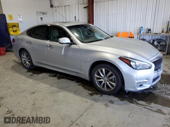 ✅ 2015 Infiniti Q70 • VIN: JN1BY1AP8FM540073 • Lot: 44041175. Listed on Copart with 105,972 mi. Free auction sales archive from the USA and detailed vehicle history report at DreamBid. Image 4.