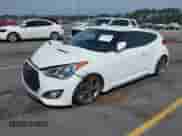 2013 Hyundai Veloster Turbo с VIN KMHTC6AE6DU112233, выставлен на аукционе IAAI как лот 42295962 с пробегом 151 091 миль миль и . История ставок и продаж доступна на DreamBid. Изображение 2.