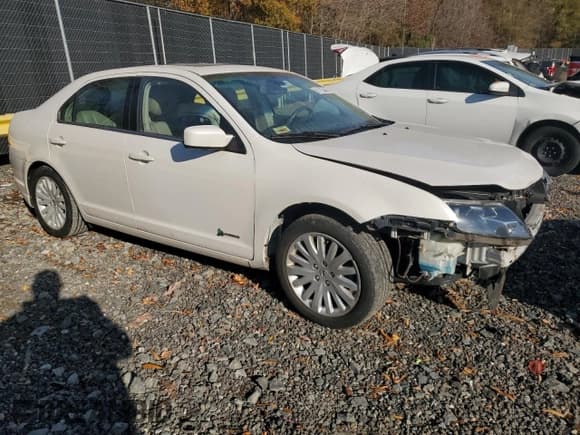 ✅ 2012 Ford Fusion Hybrid • VIN: 3FADP0L3XCR251234 • Лот: 91115445. Опубликован ранее на Copart с пробегом 110 774 миль. Бесплатный доступ к архиву аукционных продаж из США и подробный отчёт об истории автомобиля на DreamBid. Изображение 4.