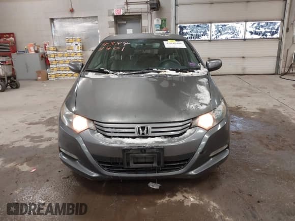 ✅ 2010 Honda Insight LX • VIN: JHMZE2H58AS038570 • Lot: 43848401. Listed on IAAI with 158,775 mi. Free auction sales archive from the USA and detailed vehicle history report at DreamBid. Image 13.