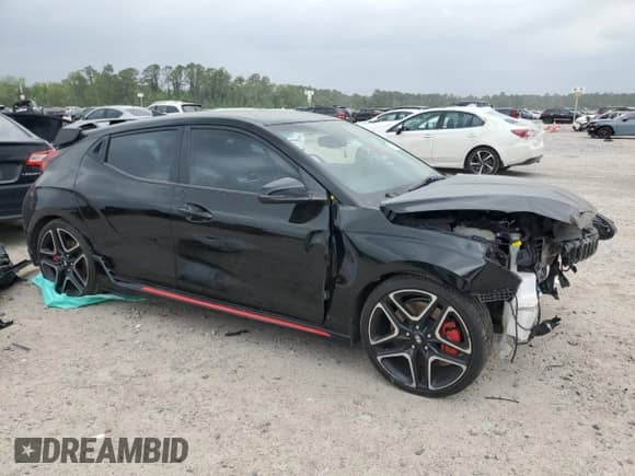 2022 Hyundai Veloster с VIN KMHT36AH2NU013176, выставлен на аукционе Copart как лот 51426135 с пробегом 74 129 миль миль и Списание • Salvage title. История ставок и продаж доступна на DreamBid. Изображение 4.