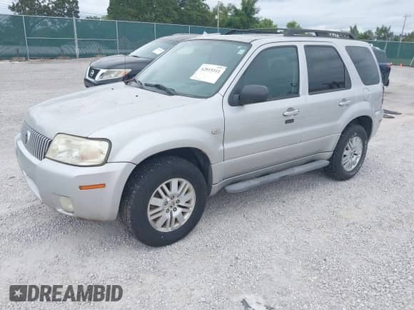 2006 Mercury Mariner Luxury with VIN 4M2YU57106KJ15112, listed as a IAAI auction lot 42815311 with 44,859 mi miles and . Bid and sale history available at DreamBid. Image 2.