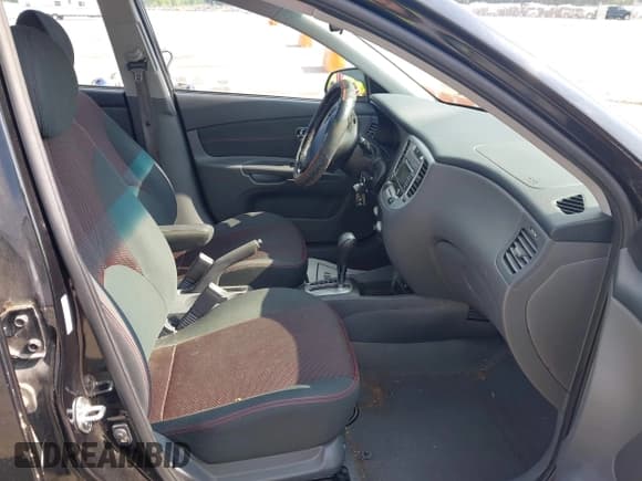 ✅ 2009 Kia Rio LX • VIN: KNADE223496504192 • Lot: 42647197. Listed on IAAI with 131,710 mi. Free auction sales archive from the USA and detailed vehicle history report at DreamBid. Image 5.