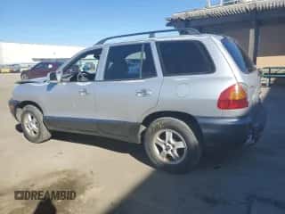 2001 Hyundai Santa Fe GLS z VIN KM8SC83D51U097893, wystawiony jako Copart lot #42773215 z przebiegiem 113 181 mil mil oraz Szkoda całkowita • Salvage title. Historia ofert i sprzedaży dostępna na DreamBid. Obrazek 2.