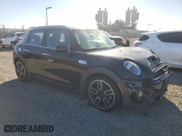 ✅ 2019 MINI Hardtop 4 Door Cooper S • VIN: WMWXU3C59K2H86738 • Lot: 91324075. Listed on Copart with 82,878 mi. Free auction sales archive from the USA and detailed vehicle history report at DreamBid. Image 4.