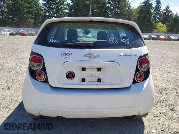 2013 Chevrolet Sonic LT z VIN 1G1JD6SG0D4199810, wystawiony jako Copart lot #63103015 z przebiegiem 128 825 mil mil oraz Szkoda całkowita • Salvage title. Historia ofert i sprzedaży dostępna na DreamBid. Obrazek 6.