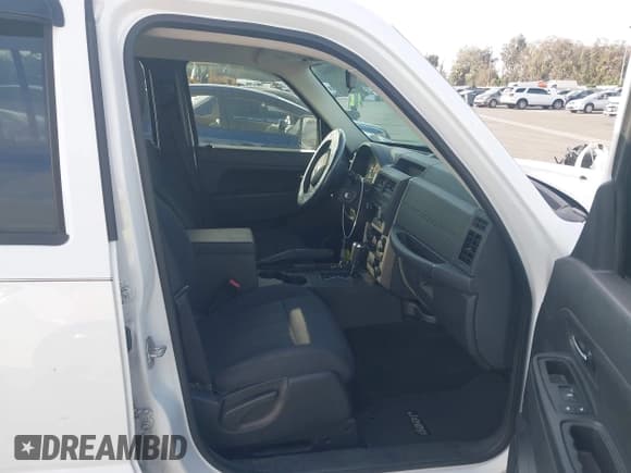 ✅ 2012 Jeep Liberty Sport • VIN: 1C4PJMAK4CW100199 • Lot: 43588161. Listed on IAAI with 64,376 mi. Free auction sales archive from the USA and detailed vehicle history report at DreamBid. Image 5.