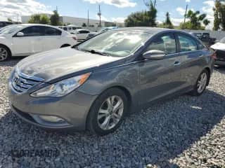 2013 Hyundai Sonata Limited with VIN 5NPEC4AC5DH672996, listed as a Copart auction lot 82443505 with 86,791 mi miles and Salvage title. Bid and sale history available at DreamBid. Image 1.