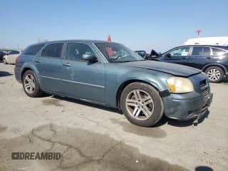 ✅ 2005 Dodge Magnum RT • VIN: 2D8GV58295H676163 • Lot: 90514075. Listed on Copart with 114,673 mi. Free auction sales archive from the USA and detailed vehicle history report at DreamBid. Image 4.