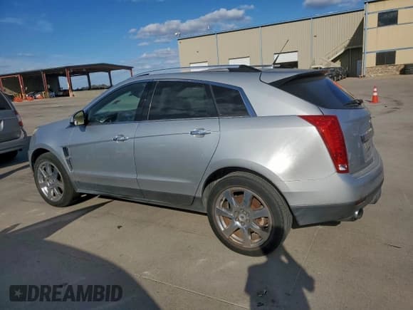 ✅ 2011 Cadillac SRX Performance Collection • VIN: 3GYFNBEYXBS536854 • Lot: 92413205. Listed on Copart with 177,791 mi. Free auction sales archive from the USA and detailed vehicle history report at DreamBid. Image 2.