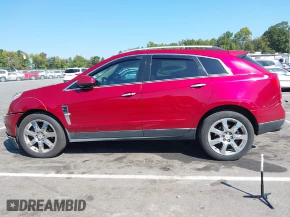 ✅ 2012 Cadillac SRX Performance Collection • VIN: 3GYFNBE31CS571210 • Lot: 43251543. Listed on IAAI with 186,568 mi. Free auction sales archive from the USA and detailed vehicle history report at DreamBid. Image 14.