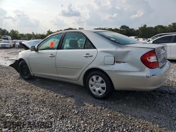 ✅ 2002 Toyota Camry LE • VIN: 4T1BE32K12U105714 • Lot: 71852545. Listed on Copart with Not provided. Free auction sales archive from the USA and detailed vehicle history report at DreamBid. Image 2.
