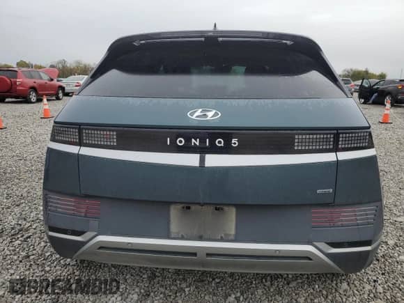 2023 Hyundai Ioniq 5 SEL with VIN KM8KNDAF0PU127981, listed as a Copart auction lot 90379705 with 58,426 mi miles and Salvage title. Bid and sale history available at DreamBid. Image 6.