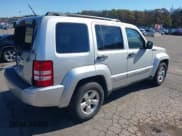 ✅ 2010 Jeep Liberty Sport • VIN: 1J4PN2GK1AW178964 • Lot: 43437287. Listed on IAAI with 124,787 mi. Free auction sales archive from the USA and detailed vehicle history report at DreamBid. Image 4.