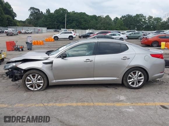 ✅ 2012 Kia Optima EX • VIN: 5XXGN4A62CG074341 • Lot: 43106753. Listed on IAAI with 129,666 mi. Free auction sales archive from the USA and detailed vehicle history report at DreamBid. Image 14.