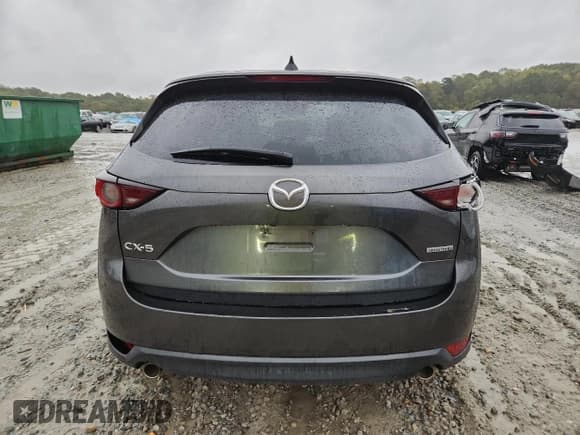 ✅ 2021 Mazda CX-5 Touring • VIN: JM3KFACM0M0358384 • Лот: 90115125. Опубликован ранее на Copart с пробегом 101 493 миль. Бесплатный доступ к архиву аукционных продаж из США и подробный отчёт об истории автомобиля на DreamBid. Изображение 6.