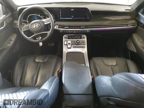 2023 Hyundai Palisade Calligraphy с VIN KM8R74GE7PU611850, выставлен на аукционе Copart как лот 63023794 с пробегом 36 259 миль миль и Списание • Salvage title. История ставок и продаж доступна на DreamBid. Изображение 8.