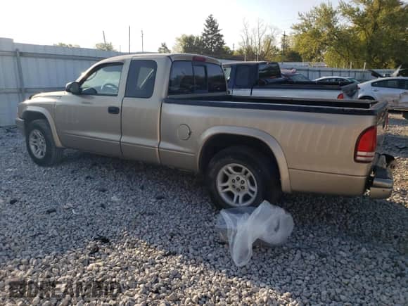 2004 Dodge Dakota with VIN 1D7GL12K14S545148, listed as a Copart auction lot 72534984 with 97,050 mi miles and Salvage title. Bid and sale history available at DreamBid. Image 2.