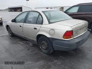 1998 Saturn SL z VIN 1G8ZH5289WZ313076, wystawiony jako IAAI lot #43542802 z przebiegiem 196 837 mil mil oraz . Historia ofert i sprzedaży dostępna na DreamBid. Obrazek 3.