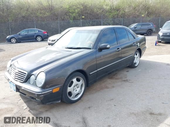✅ 2001 Mercedes-Benz E 320 • VIN: WDBJF70J51B232005 • Lot: 41912486. Listed on IAAI with 148,485 mi. Free auction sales archive from the USA and detailed vehicle history report at DreamBid. Image 2.