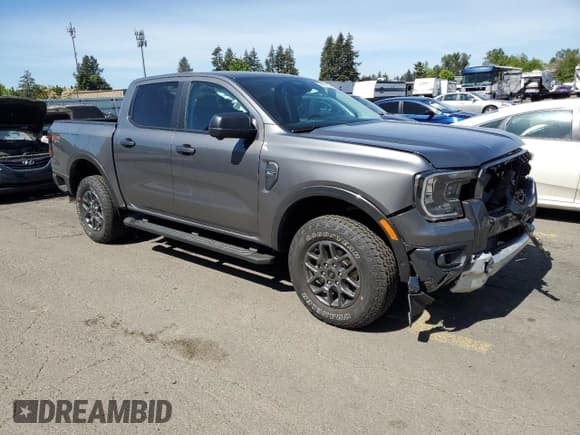 ✅ 2024 Ford Ranger XLT • VIN: 1FTER4HP8RLE40192 • Lot: 55767935. Listed on Copart with 2,650 mi. Free auction sales archive from the USA and detailed vehicle history report at DreamBid. Image 4.