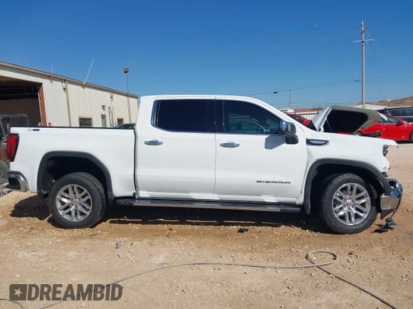 ✅ 2022 GMC Sierra 1500 SLT • VIN: 3GTU9DED0NG127165 • Lot: 41496347. Listed on IAAI with 29,892 mi. Free auction sales archive from the USA and detailed vehicle history report at DreamBid. Image 13.