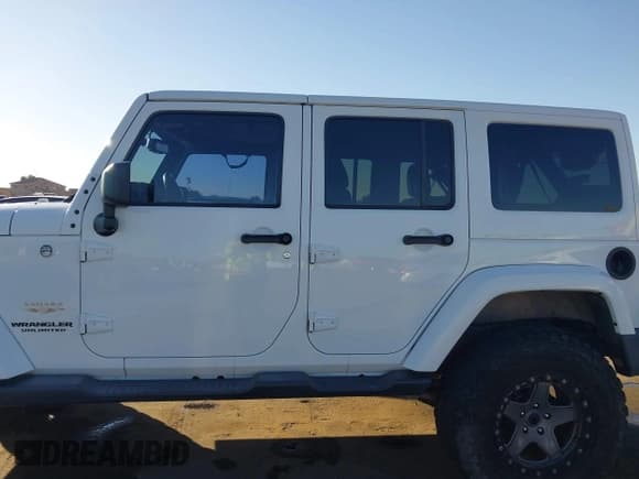 ✅ 2015 Jeep Wrangler Unlimited Sahara • VIN: 1C4BJWEG9FL519182 • Lot: 43672663. Listed on IAAI with 107,421 mi. Free auction sales archive from the USA and detailed vehicle history report at DreamBid. Image 14.