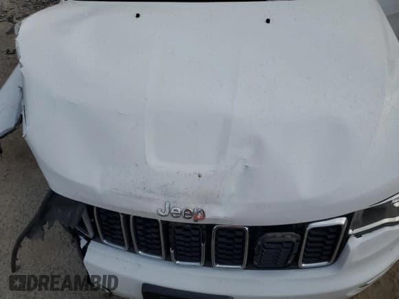 ✅ 2018 Jeep Grand Cherokee Laredo E • VIN: 1C4RJEAG2JC241930 • Lot: 56187645. Listed on Copart with 178,244 mi. Free auction sales archive from the USA and detailed vehicle history report at DreamBid. Image 12.