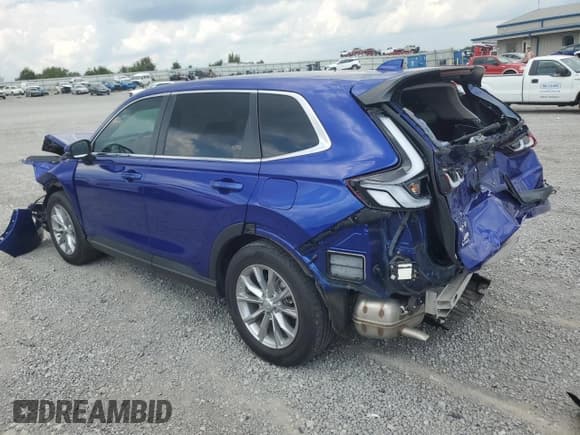 ✅ 2023 Honda CR-V EX-L • VIN: 7FARS3H76PE001674 • Lot: 68370705. Listed on Copart with 22,621 mi. Free auction sales archive from the USA and detailed vehicle history report at DreamBid. Image 2.