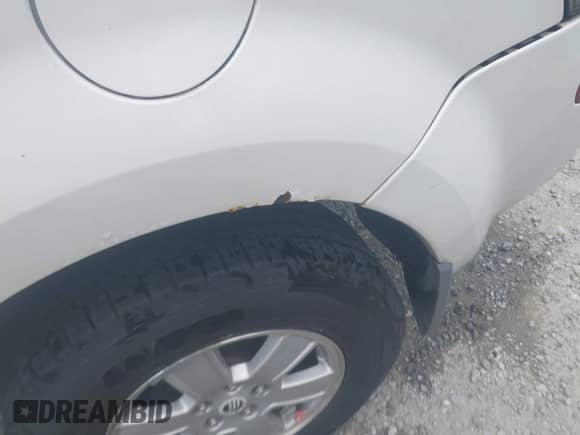 2010 Mercury Mariner с VIN 4M2CN9BG7AKJ28216, выставлен на аукционе IAAI как лот 42876189 с пробегом 174 575 миль миль и . История ставок и продаж доступна на DreamBid. Изображение 13.