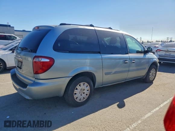 ✅ 2005 Chrysler Town & Country LX • VIN: 2C4GP44R45R227733 • Lot: 96357985. Listed on Copart with 63,790 mi. Free auction sales archive from the USA and detailed vehicle history report at DreamBid. Image 3.