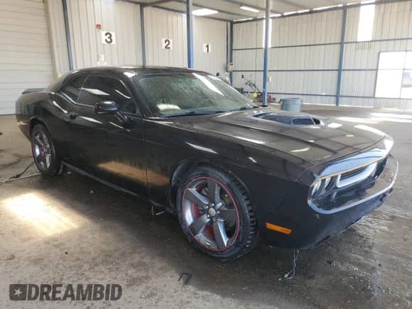 2014 Dodge Challenger Shaker z VIN 2C3CDYBT8EH231677, wystawiony jako Copart lot #67840475 z przebiegiem 156 898 mil mil oraz Szkoda całkowita • Salvage title. Historia ofert i sprzedaży dostępna na DreamBid. Obrazek 4.