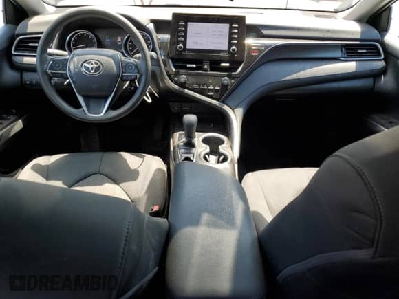 2023 Toyota Camry LE z VIN 4T1C11BK0PU083197, wystawiony jako Copart lot #64838595 z przebiegiem 67 089 mil mil oraz Nie do naprawy • Non repairable. Historia ofert i sprzedaży dostępna na DreamBid. Obrazek 8.