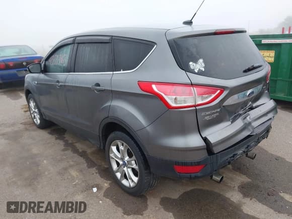 ✅ 2013 Ford Escape SEL • VIN: 1FMCU0H9XDUA10114 • Lot: 43535463. Listed on IAAI with 156,487 mi. Free auction sales archive from the USA and detailed vehicle history report at DreamBid. Image 3.