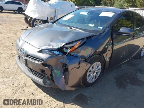 ✅ 2022 Toyota Prius L Eco • VIN: JTDKAMFU3N3189384 • Lot: 43575250. Listed on IAAI with 155,443 mi. Free auction sales archive from the USA and detailed vehicle history report at DreamBid. Image 6.