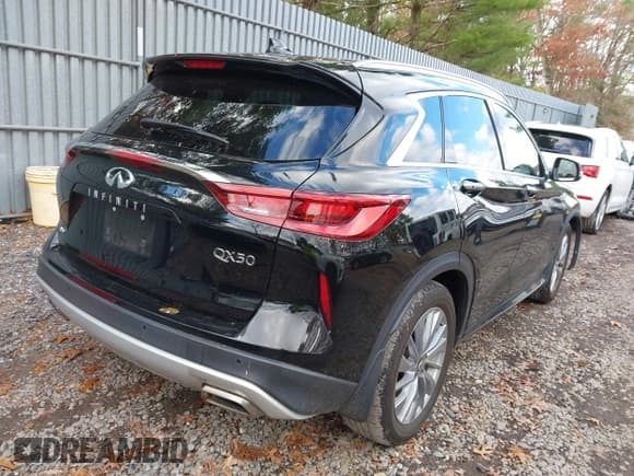 ✅ 2023 Infiniti QX50 Luxe • VIN: 3PCAJ5BB8PF112859 • Lot: 43659585. Listed on IAAI with 31,556 mi. Free auction sales archive from the USA and detailed vehicle history report at DreamBid. Image 4.