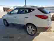 2012 Hyundai Tucson Limited with VIN KM8JUCAC1CU519960, listed as a Copart auction lot 67451415 with 222,008 mi miles and Salvage title. Bid and sale history available at DreamBid. Image 2.