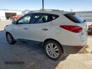2012 Hyundai Tucson Limited z VIN KM8JUCAC1CU519960, wystawiony jako Copart lot #67451415 z przebiegiem 222 008 mil mil oraz Szkoda całkowita • Salvage title. Historia ofert i sprzedaży dostępna na DreamBid. Obrazek 2.