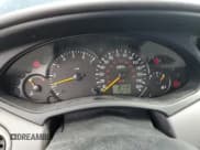 ✅ 2004 Ford Focus ZX3 • VIN: 3FAFP31344R119116 • Lot: 71017385. Listed on Copart with 73,275 mi. Free auction sales archive from the USA and detailed vehicle history report at DreamBid. Image 9.